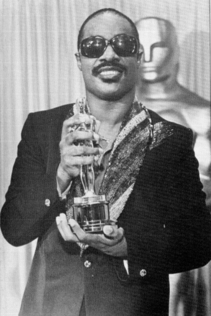 Stevie Wonder receiving Oscar Academy Award