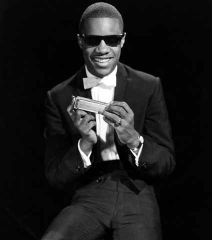 Stevie Wonder with harmonica
